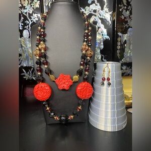 Handmade cinnabar black and red glass two strand necklace and earring set